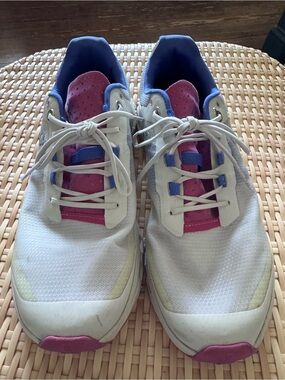 On Running White Athletic Sneakers with Pink and Blue Accents